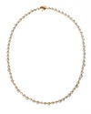 diamond and gold necklace on white background
