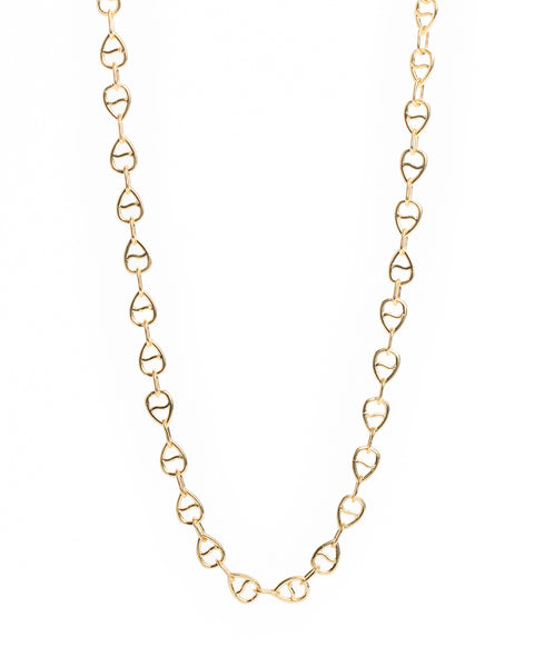 Gold chain necklace on a white background