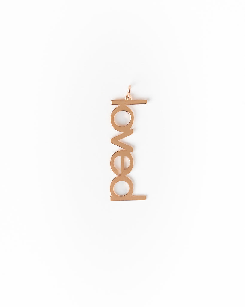 Decorative hanging sign with 'LOVED' on a white background