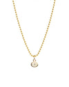 Gold necklace with a small round pendant on a white background