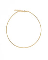 Gold necklace on a white background