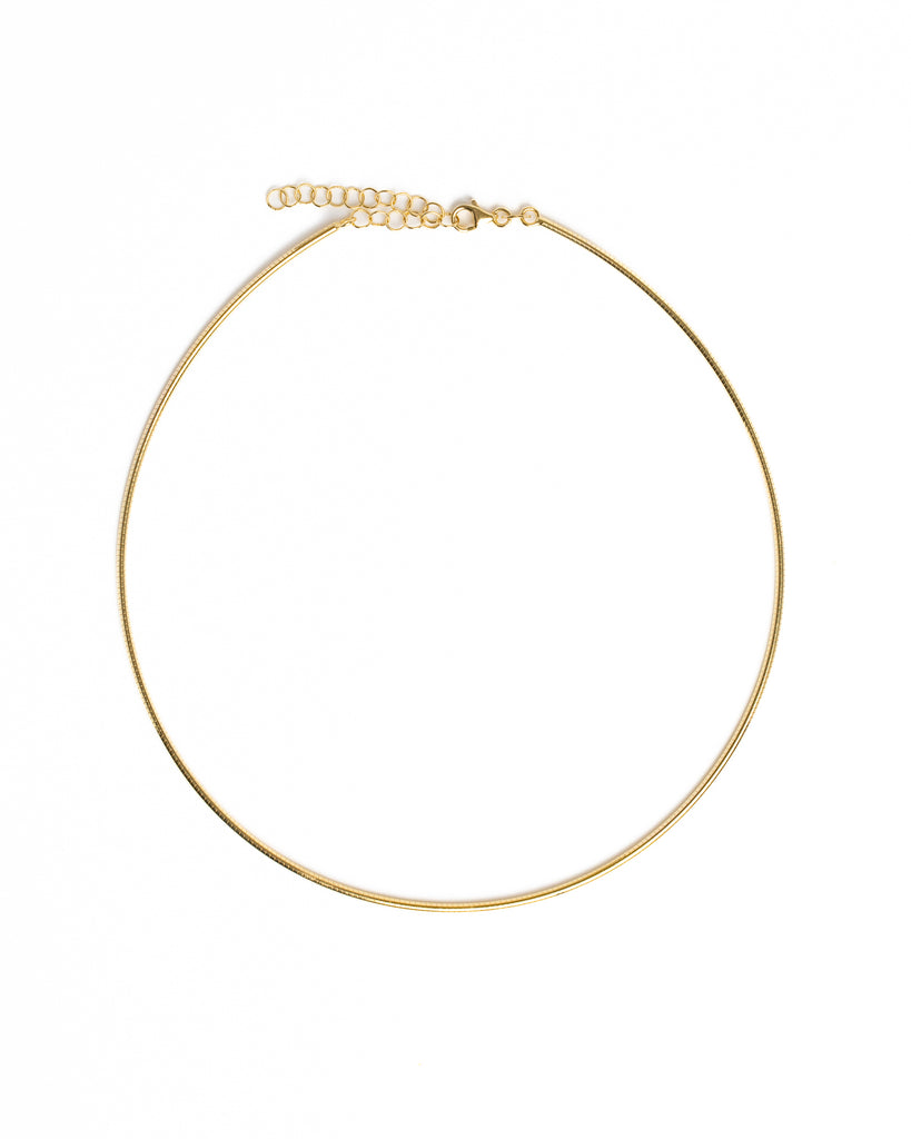 Gold necklace on a white background