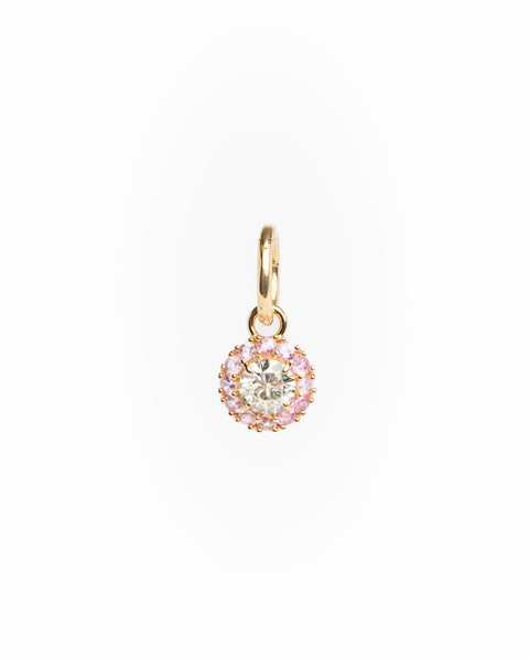 Gold pendant with a central diamond and pink gemstones on a white background