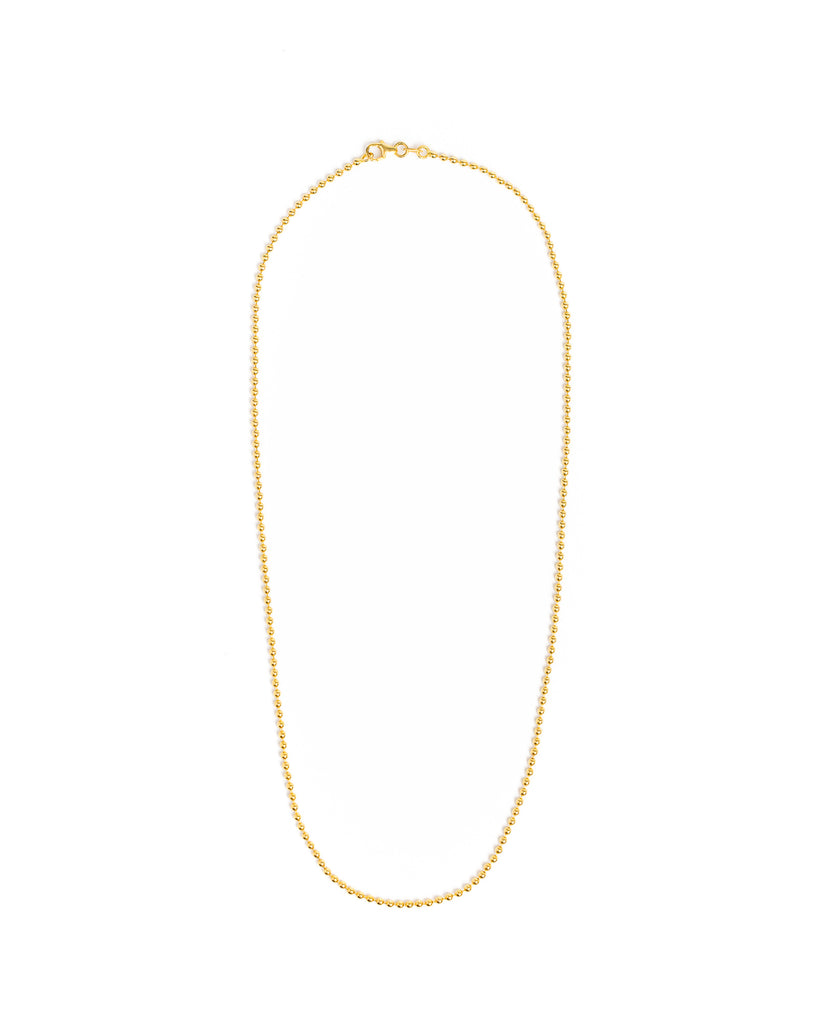 Gold chain necklace on a white background