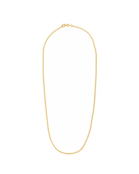 Gold chain necklace on a white background