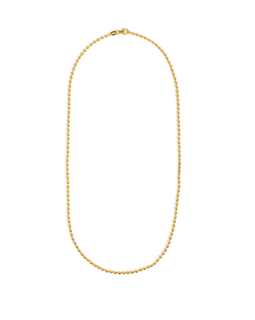Gold necklace on a white background