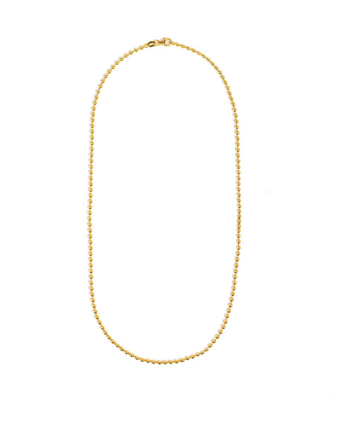 Gold necklace on a white background