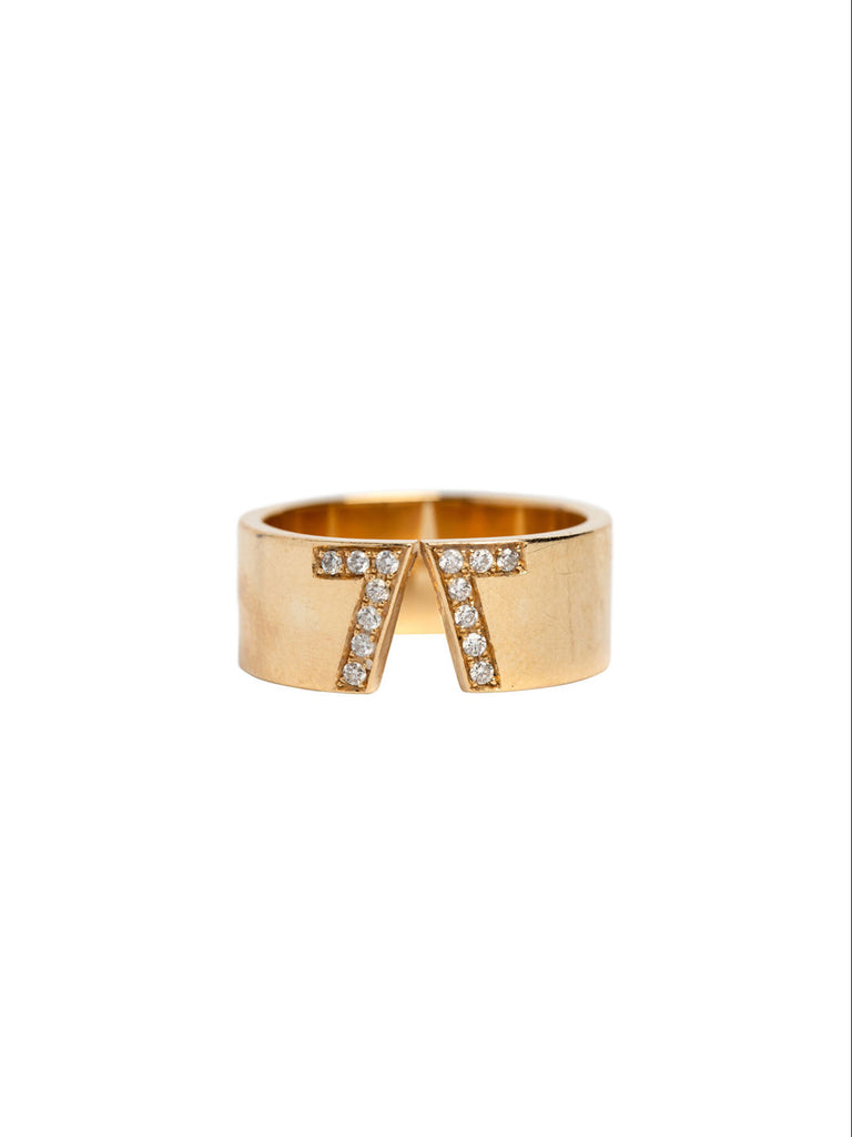 Genevieve Lau jewelry. Monaco ring. Gold ring with diamonds in the shape of sevens.  